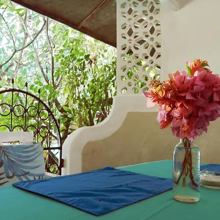 Frangipani Cottages Diani Beach Exterior photo