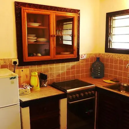 Frangipani Cottages Diani Beach Exterior photo