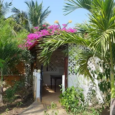 Frangipani Cottages Diani Beach Exterior photo