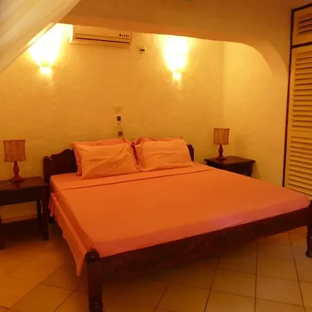Frangipani Cottages Diani Beach Exterior photo