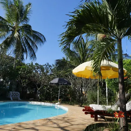 Frangipani Cottages Diani Beach Exterior photo