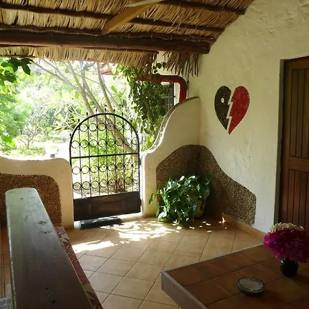 Frangipani Cottages Diani Beach Exterior photo