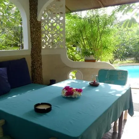Frangipani Cottages Diani Beach Exterior photo