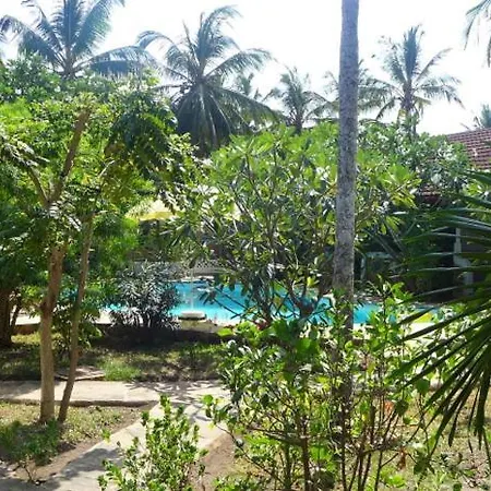 Frangipani Cottages Diani Beach Exterior photo